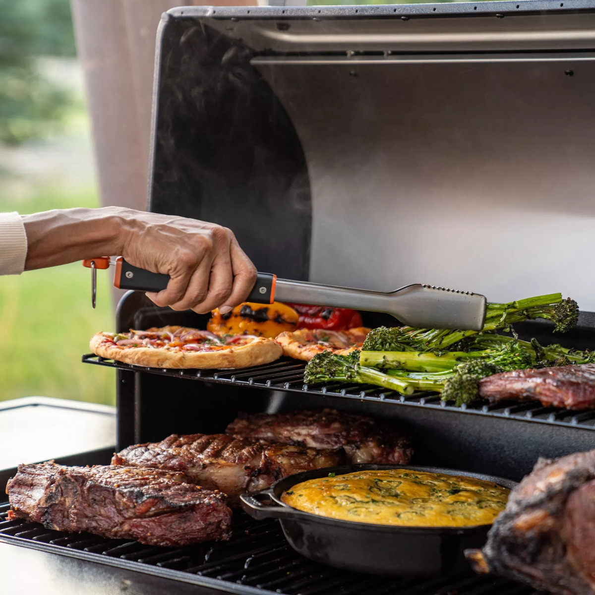 traeger-2025-bbq-tongs-lifestyle1.png Traeger 2025 bbq tongs lifestyle1.png